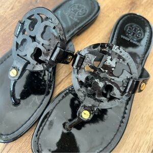 Tory Burch Black Sandals with Gold Accents